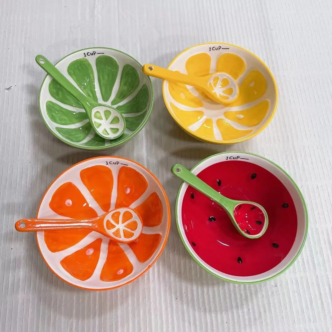 Colorful bowls with spoon