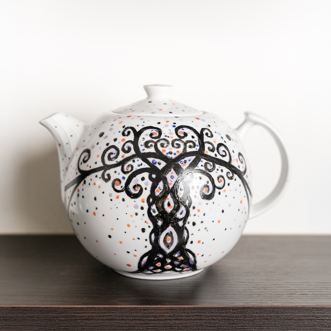 Hand-painted ceramic kettle