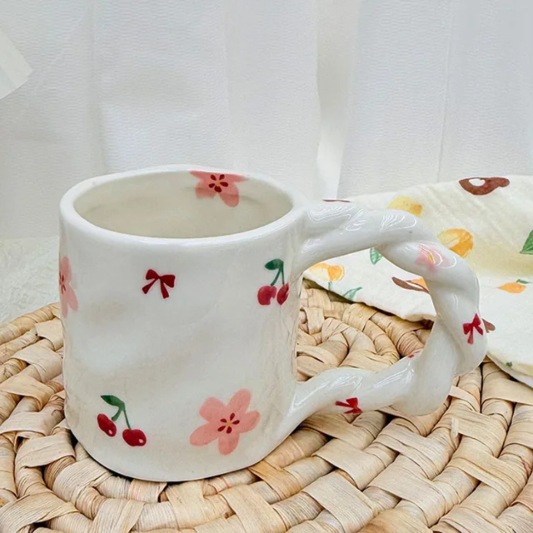 Spiral handle mug with cherry and flowers