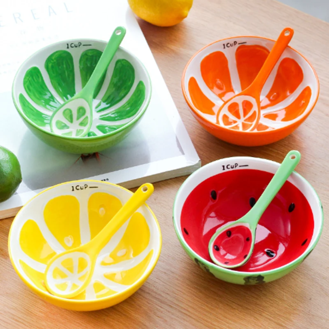 Colorful bowls with spoon