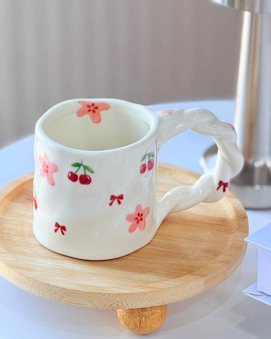 Spiral handle mug with cherry and flowers